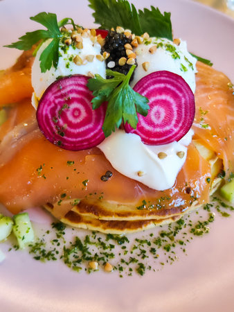 Coffee and a breakfast is on the table. Meal with a funny face.の写真素材