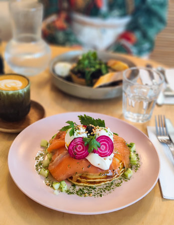 Coffee and a breakfast is on the table. Meal with a funny face.の写真素材