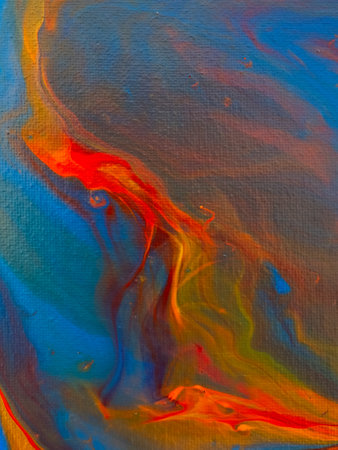 Fluid art painting. Blue, golden, red, yellow, orange.の写真素材