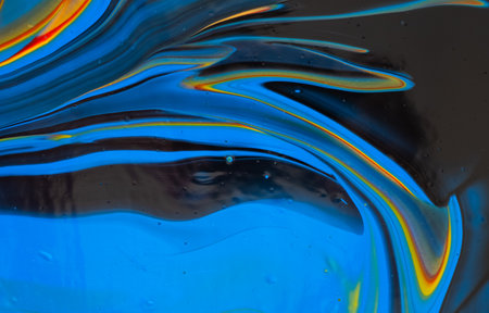 Fluid art painting. Blue, golden, red, yellow, orange.の写真素材
