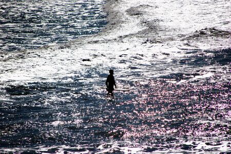 Surfer in action on a powerful wave 