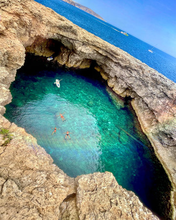 People are swimming in the lagoonの写真素材