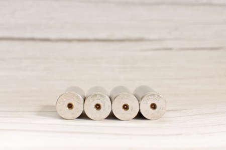 Pile of fire bullets or ammunition on the gray background.