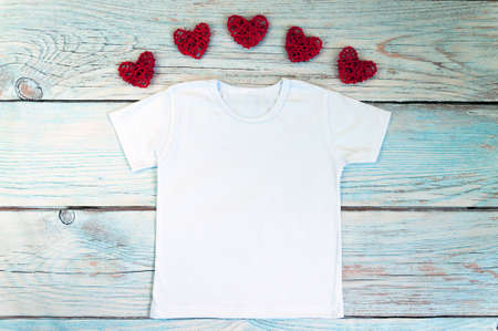 Blank white t-shirt with heart decor, unisex valentine's day apparel mock up. Stock photoの写真素材