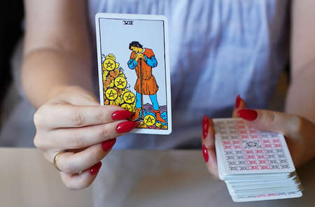 Defocused mystic ritual with tarot cards, and candles.のeditorial素材