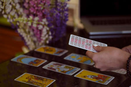 Blurred background of Tarot cards on table. High quality photoのeditorial素材
