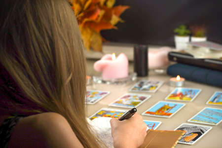 Blurred illustrative editorial tarot cards, the studying.のeditorial素材