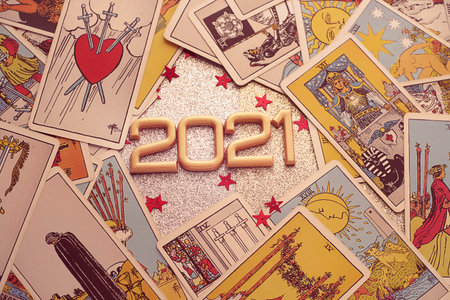 A pile of tarot trump cards jumbled, scattered and haphazardly arranged. Christmas concept. High quality photoのeditorial素材