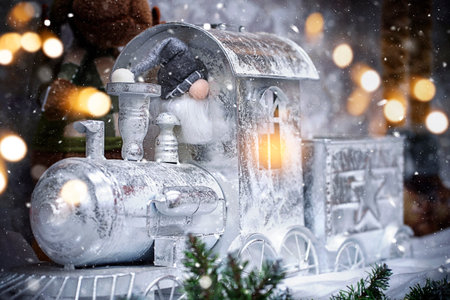 Blurred Christmas Toy Train with defocused lights. High quality photo