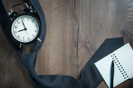 Flat lay Man set: tie, pen, phone, notebook, wooden background