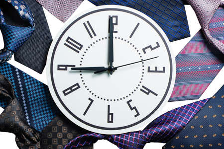 Business concept with necktie and Clock show 9 am. Set different neckties. Colored tie for men. Set...