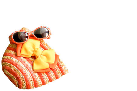 Girl's straw handbag and glasses. Summer concept. High quality photoの写真素材