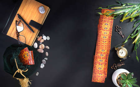 Tarot card reader arranges cards in a card spread.Fortune-telling on traditional tarot cards on the...
