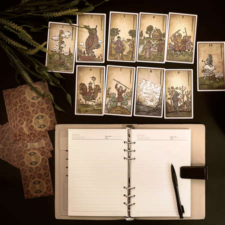 Tarot cards and esoteric concept. Magic rituals. Mystical table with details