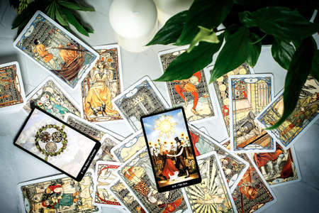 Tarot cards on fortune teller desk. Future reading and esoteric concept. Magic rituals. Mystical...