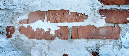 Empty Old Brick Wall Texture. Painted Distressed Wall Surface. Grungy Wide Brick wall. Grunge Red...