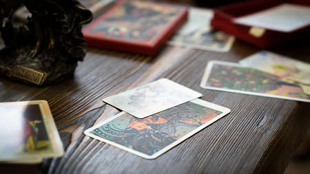 Tarot cards on the table, esoteric concept, fortune telling and predictions. High quality photoTarot cards on the table, esoteric concept, fortune telling and predictionsのeditorial素材