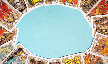 View of Golden tarot cards Frame on the Blue background, esoteric concept, fortune telling and...