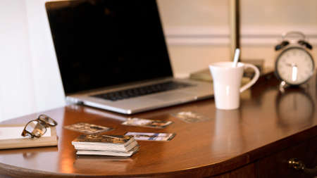 Blurred view of tarot card on the table, esoteric concept, fortune telling and predictions. High...