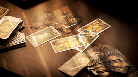 Blurred view of tarot card on the table, esoteric concept, fortune telling and predictions. High quality photoのeditorial素材
