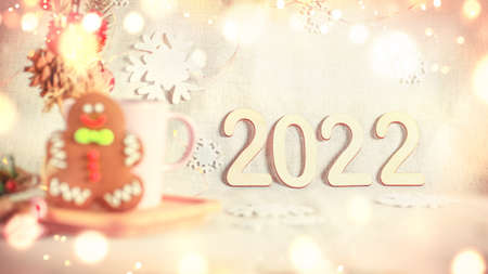 Happy New year and Christmas celebration. Number 2022 with defocused lights. Xmas holiday composition.の写真素材