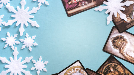 Tarot cards in Christmas decoration. Esoteric concept, fortune telling and predictions, Moscow, Russia-July 2021. High quality photoのeditorial素材
