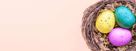 Easter composition with colorful Easter eggs in nest. Spring concept with copy space. . high quality photoの写真素材
