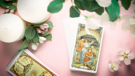 Blurred Tarot cards background on the table. Esoteric concept and astrology, Ten of cups. high quality photoのeditorial素材