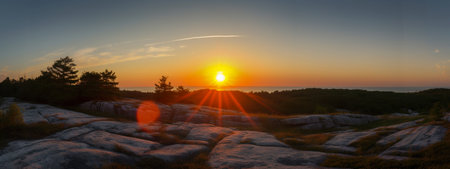 Panorama of sunset over the sea. The sun goes down. Generative AIの素材