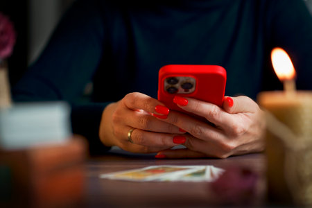 Blurred tarot cards on the table, esoteric concept, fortune telling predictionsの写真素材