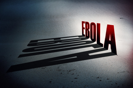 Mystic Ebola with long shadow on sandの写真素材