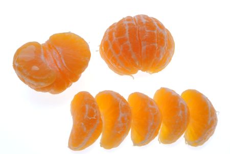 segments of a tangerine isolated on white backgroundの写真素材