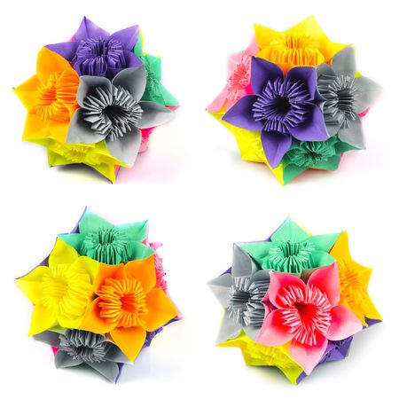 Colorfull origami kusudama from rainbow flowers isolated on white. View from four angles.の写真素材