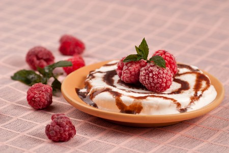 Dessert with rasberry and mint one ice cream close upの写真素材