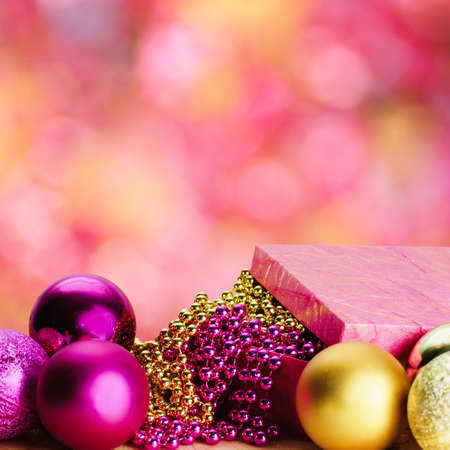 christmas pink and gold decorations isolated on whiteの写真素材