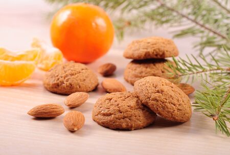 Cookies with almond and tangerins. Selective focusの写真素材