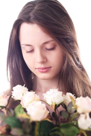 Young attractive woman's face with long haiar isolatedの写真素材