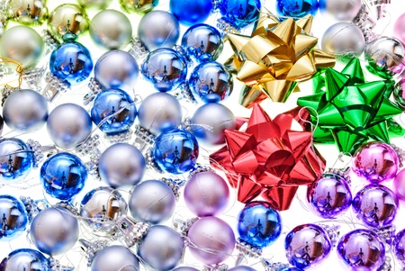 christmas-tree balls with lace and bows isolated on whiteの写真素材