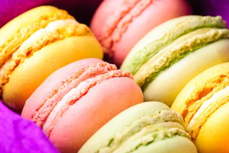 Macaroons in row close up in boxの写真素材