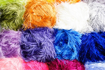 Different color "grass" threads on rows in the storeの写真素材