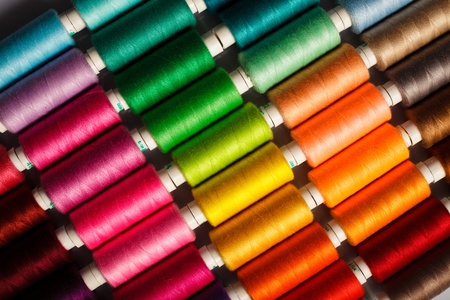 Sewing threads multicolored background closeupの写真素材