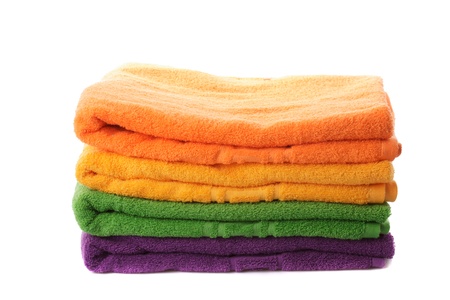 Stack of colorfull towels isolated on whiteの写真素材