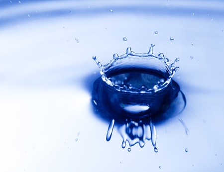 Blue water drop closeup, abstract backgroundの写真素材