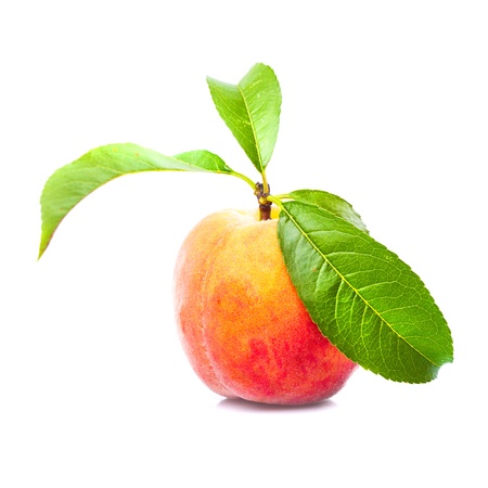 One peach with leaves isolated on white backgroundの写真素材