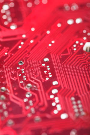 Red microchip close up background for technology design