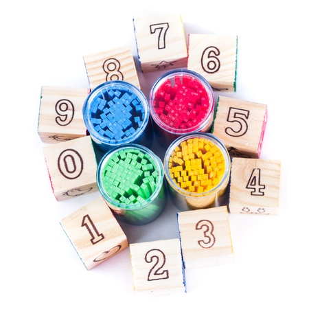 Various color counting sticks wooden cubes with digits isolatedの写真素材
