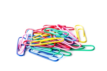 Rainbow colors heap of clips isolated on whiteの写真素材