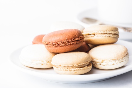 Three colors of macaroons in brown and beige tonesの写真素材