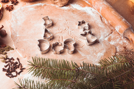 Traditional christmas gingerbread is cooking on the tableの写真素材
