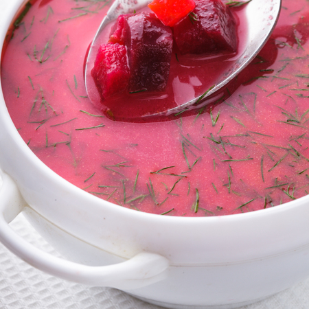 Beetroot soup in the white bowl close upの写真素材